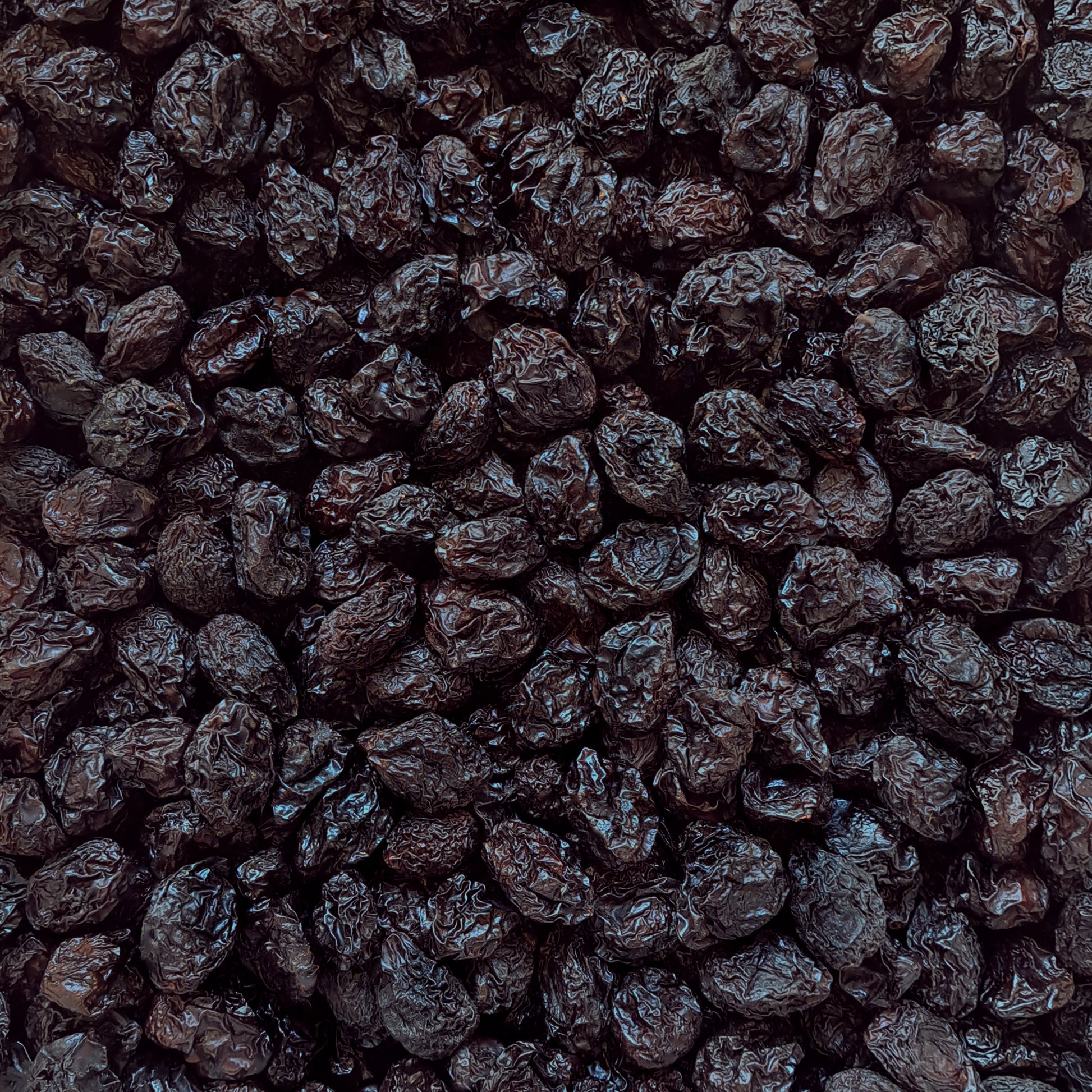 Full frame overhead image of BY NATURE Prunes - preservative-free.