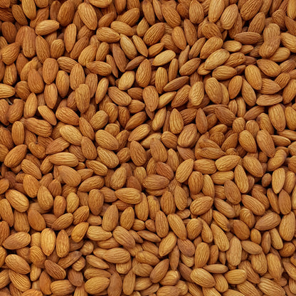 Full frame overhead image of BY NATURE Almonds - Nonpareil Supreme variety, raw, unpasteurised.