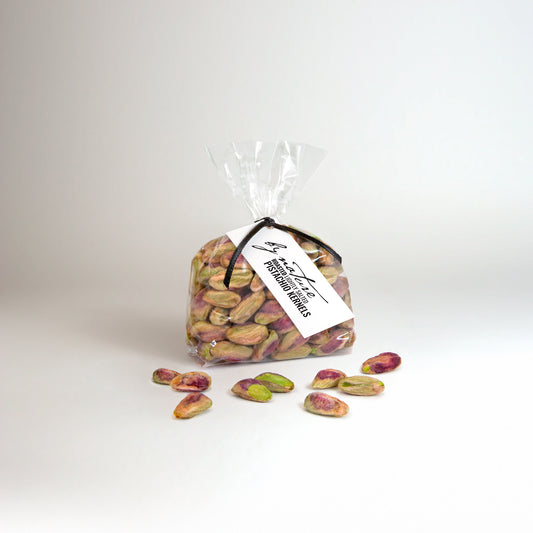 BY NATURE Shelled Pistachios, 100g - roasted, lightly salted.