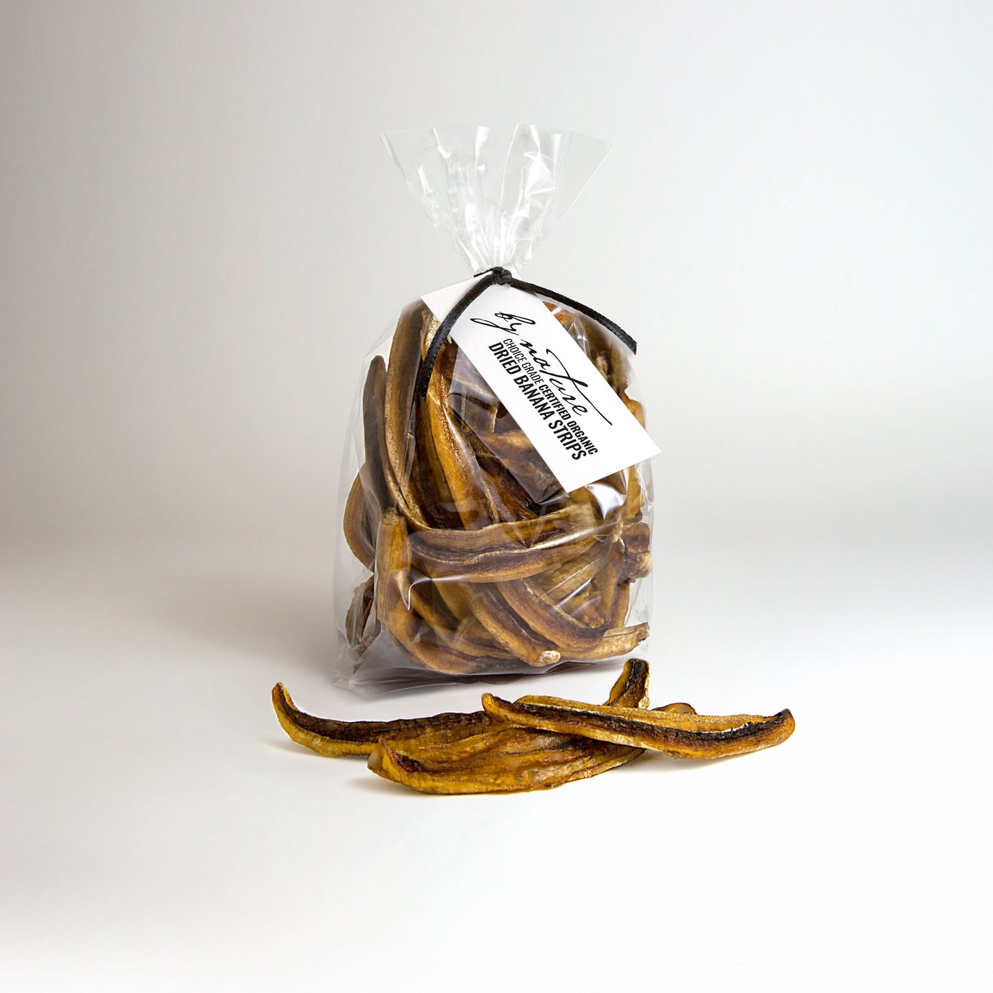 BY NATURE Dried Banana Strips, 100g - certified organic at source, preservative-free.