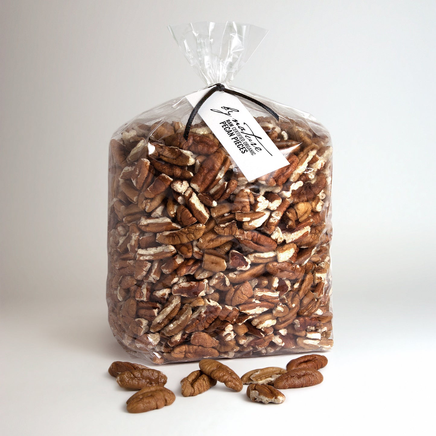 BY NATURE Pecan Pieces, 1kg - raw, certified organic at source.