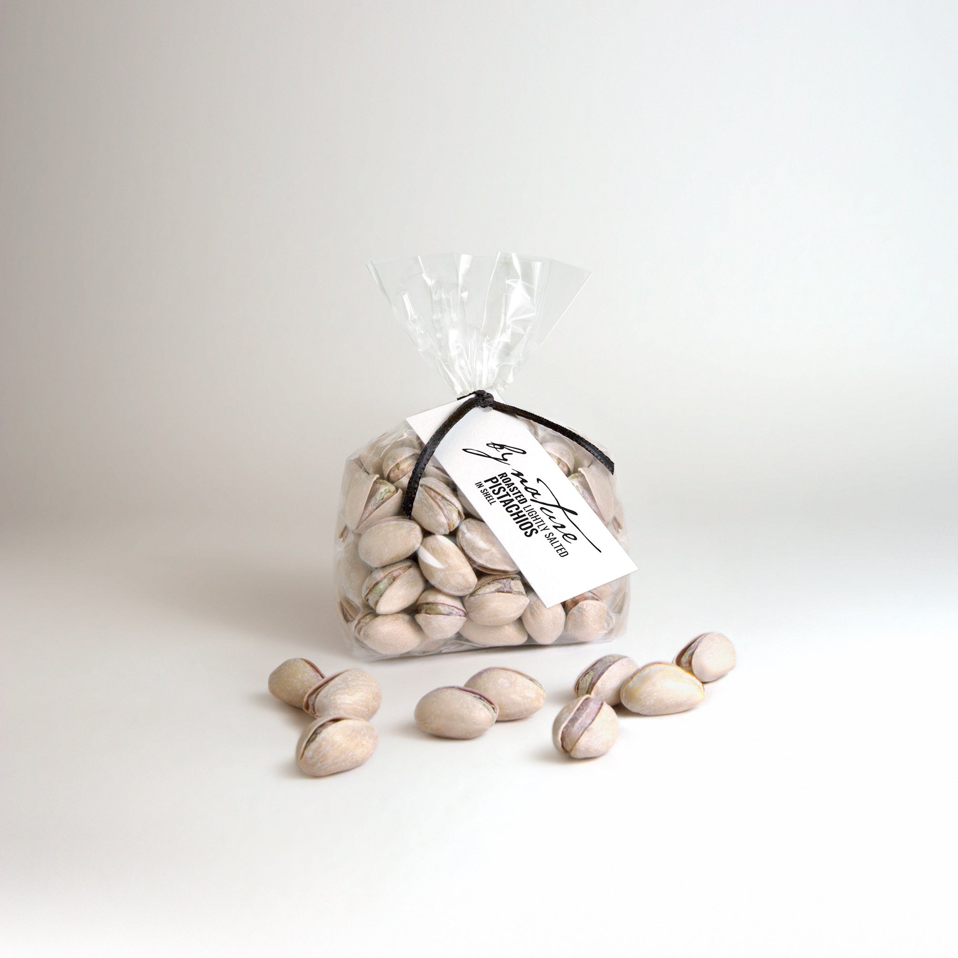 BY NATURE Pistachios in Shell, 100g - roasted, lightly salted.