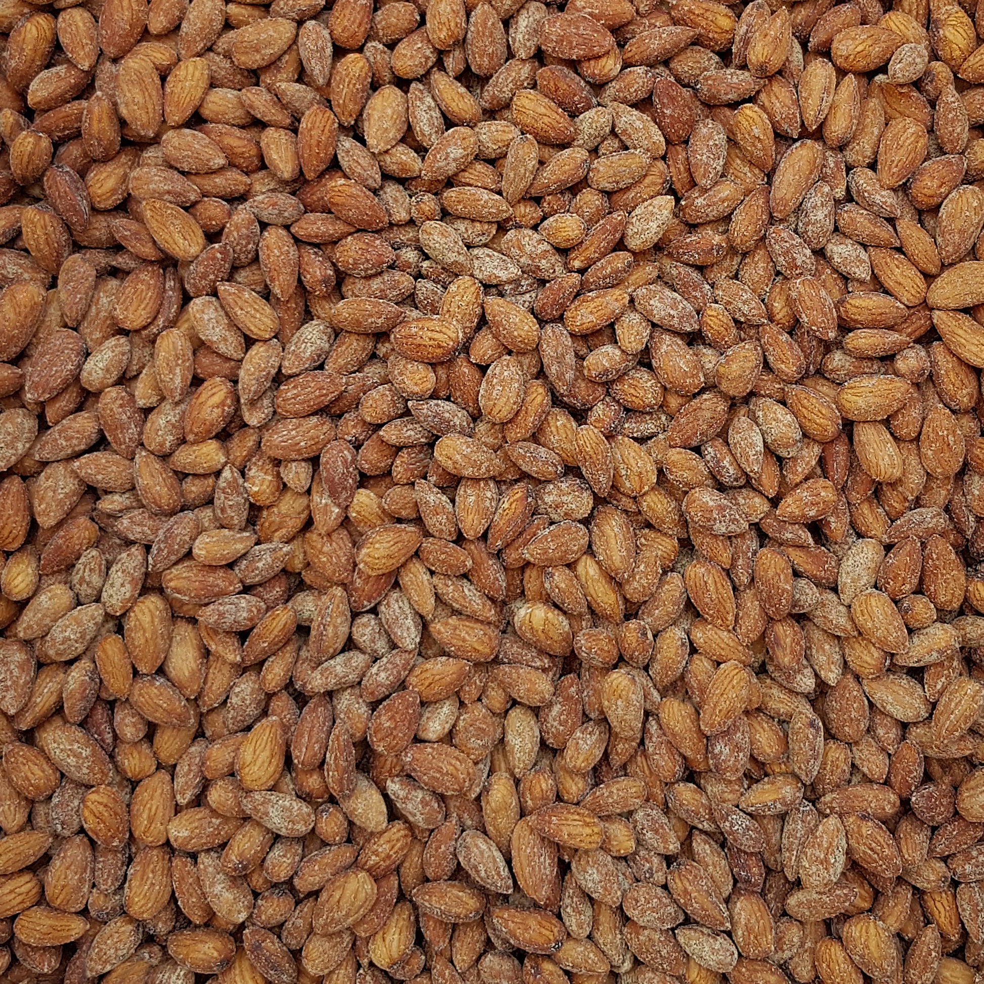 Full frame overhead image of BY NATURE Garlic & Herb Almonds - raw, activated, dried not roasted.