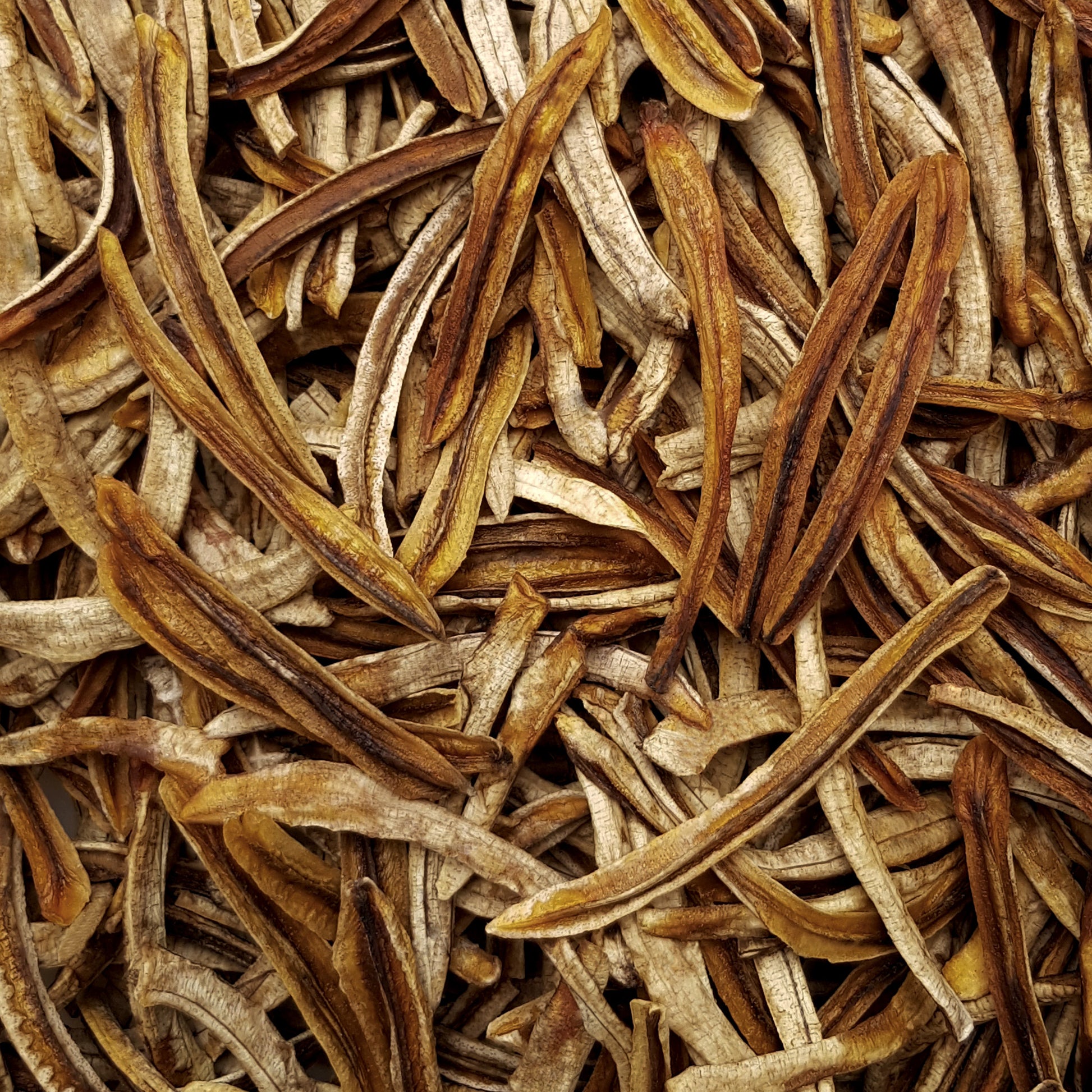 Full frame overhead image of BY NATURE Dried Banana Strips - certified organic at source, preservative-free.
