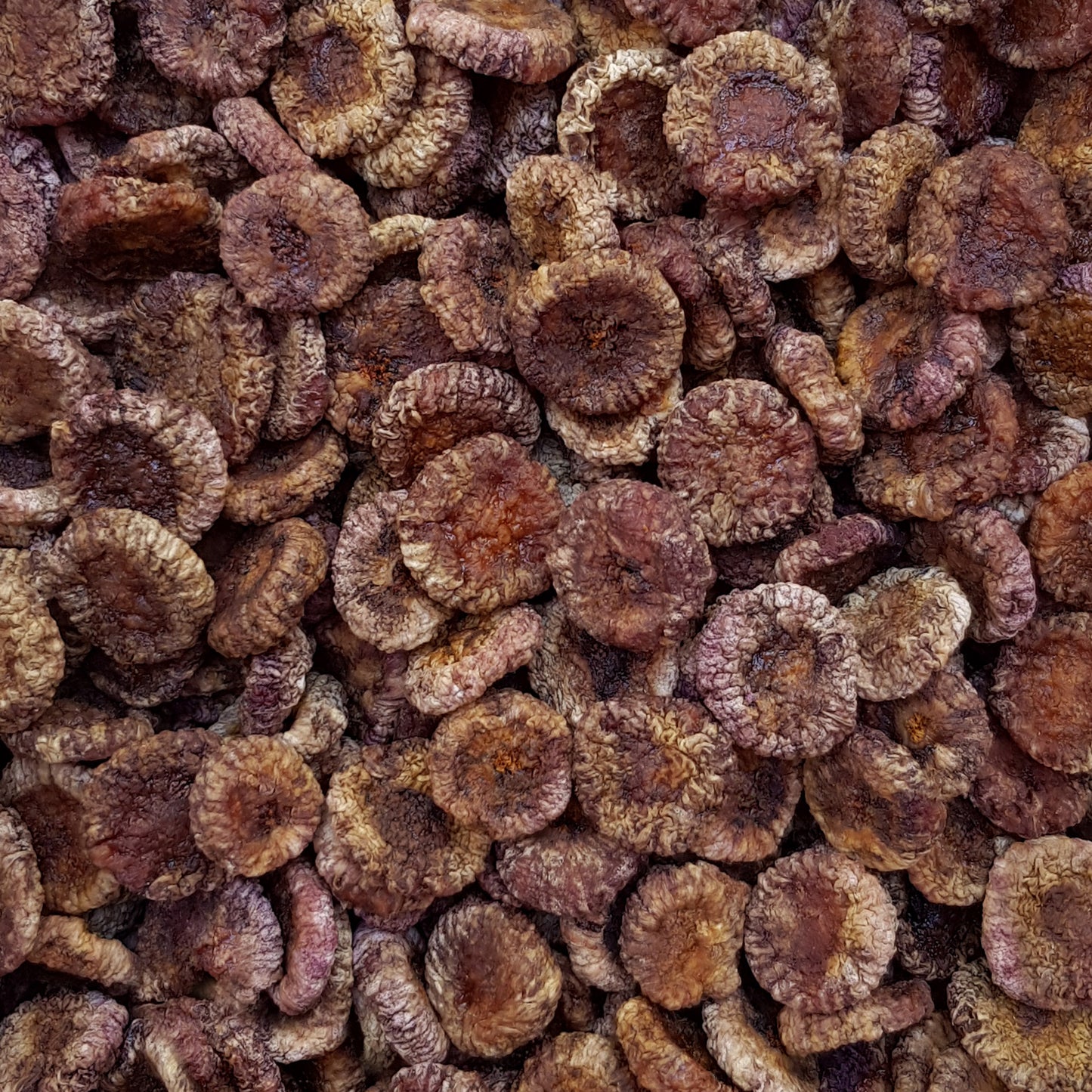 Full frame overhead image of BY NATURE Dried Black Figs - peeled, preservative-free.