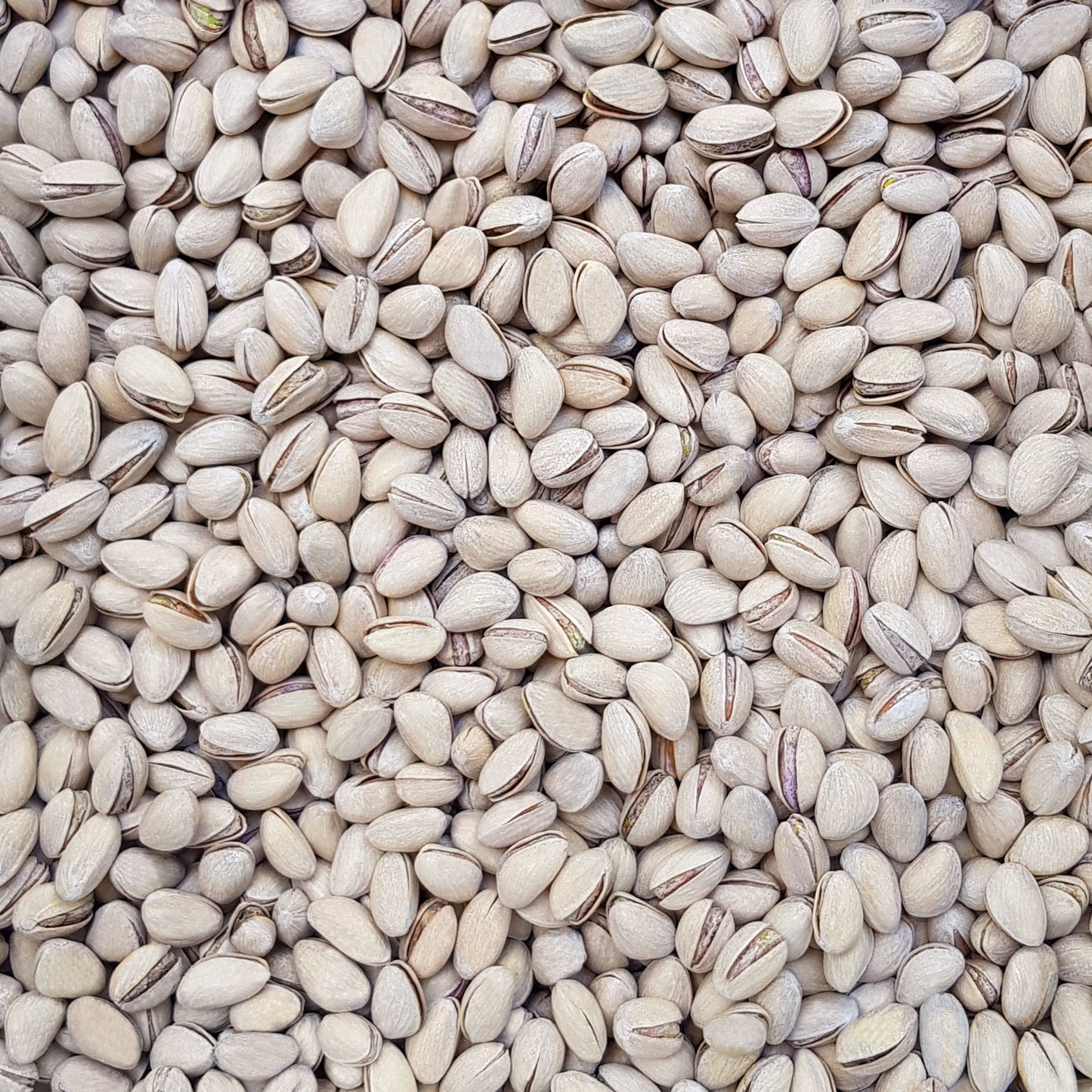 Full frame overhead image of BY NATURE Pistachios in Shell, - roasted, lightly salted.