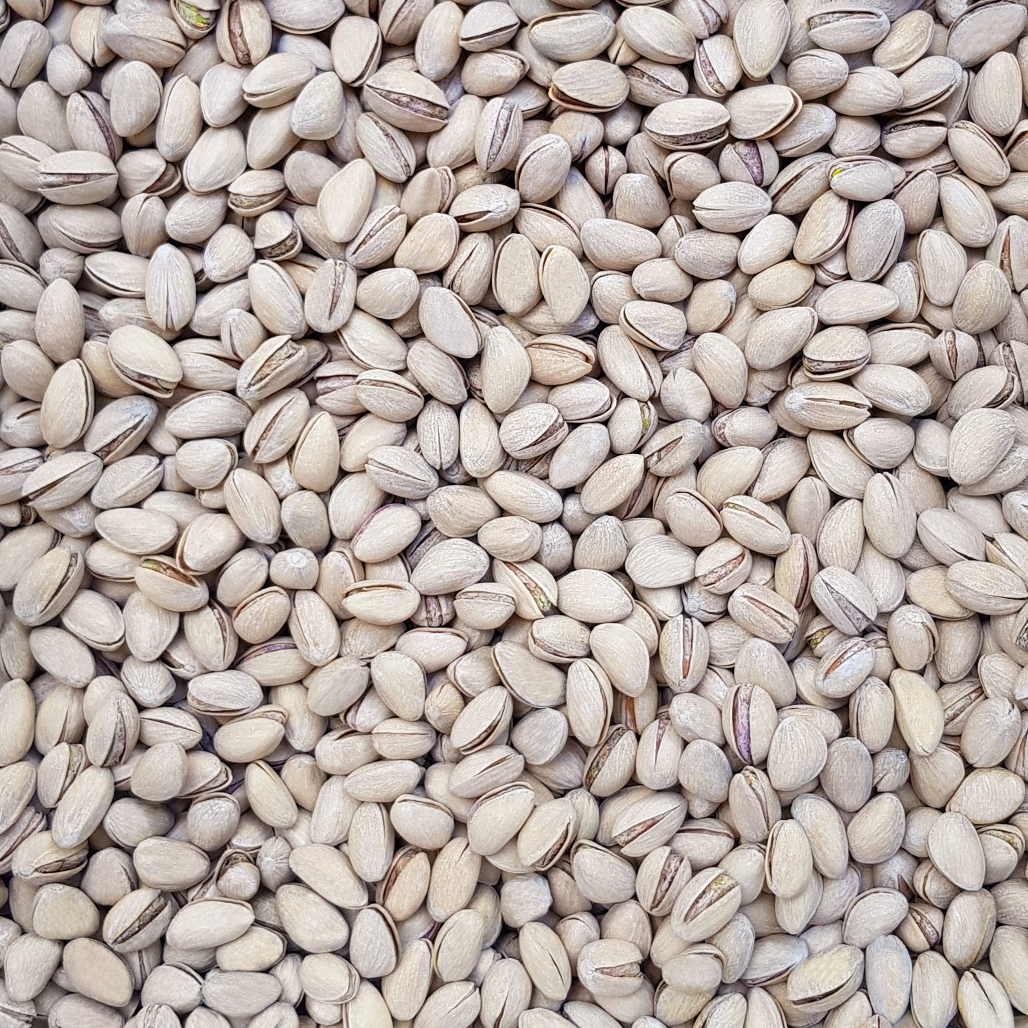 Full frame overhead image of BY NATURE Pistachios in Shell - roasted, lightly salted.