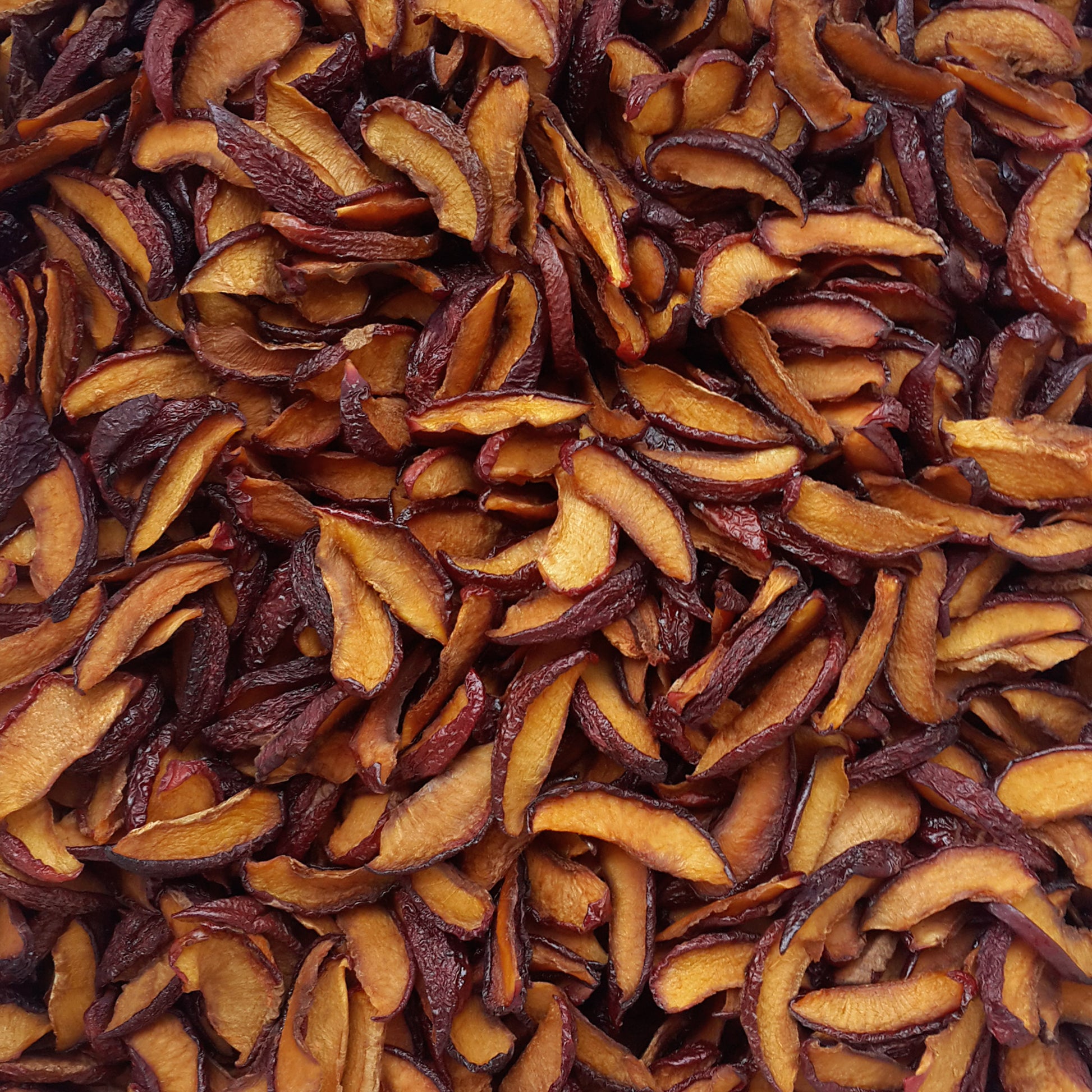 Full frame overhead image of BY NATURE Dried Plum Segments - preservative-free.
