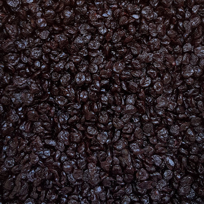 Full frame overhead image of BY NATURE Dried Sour Cherries - apple juice infused, preservative-free.