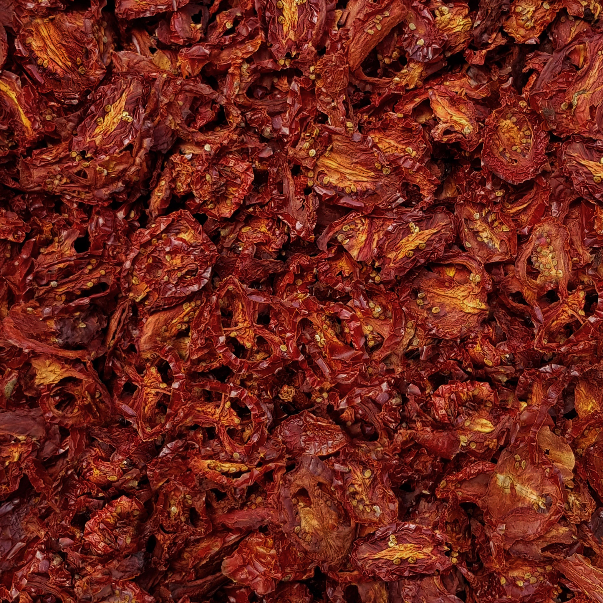Full frame overhead image of BY NATURE Dried Tomato - preservative-free.