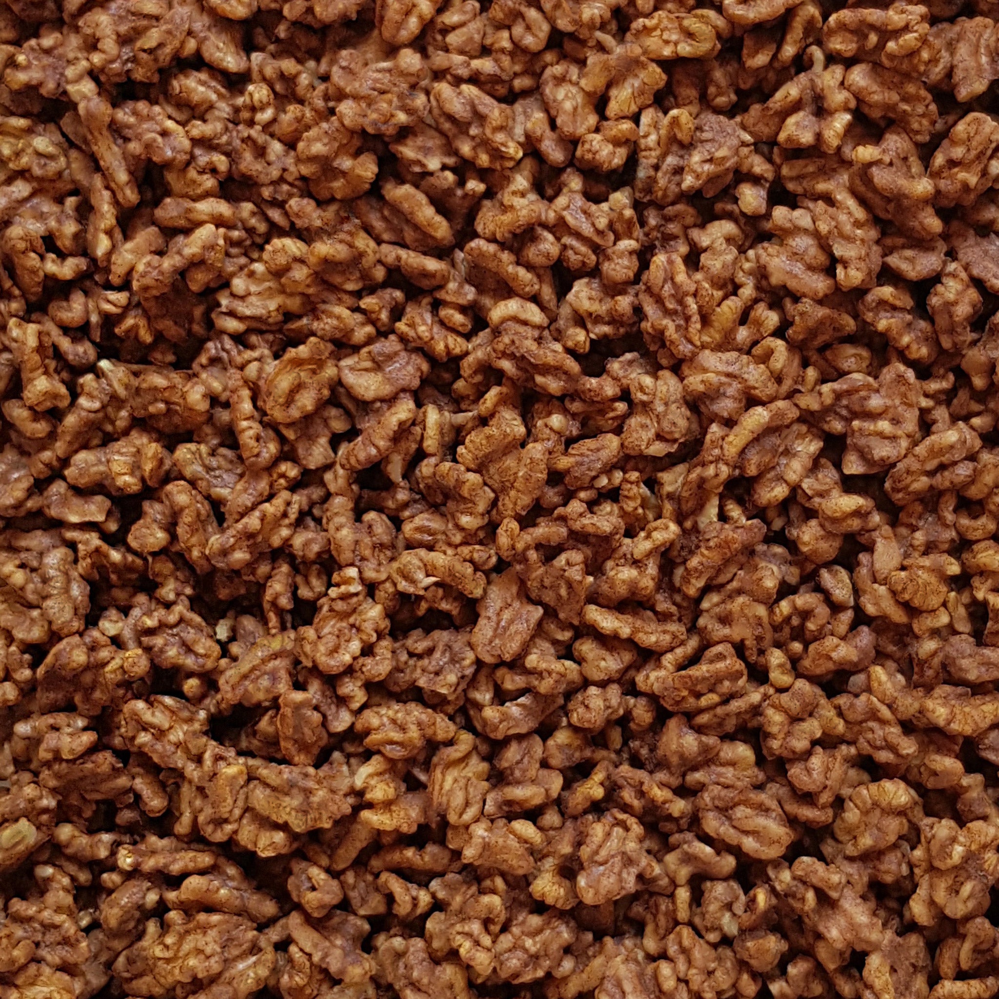 Full frame overhead image of BY NATURE Banana Toffee Walnuts - raw, activated, dried not roasted.